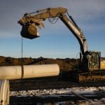 Lowering Pipeline into Trench