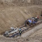 Calgary Tunneling sets up augering and pipe jacking machine.
