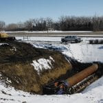 Calgary Tunneling sets up augering and pipe jacking machine.