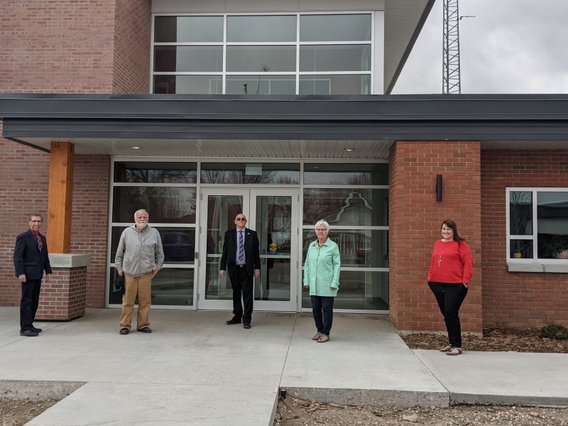 Town Council members standing in front of Fire Hall