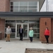Town Council members standing in front of Fire Hall